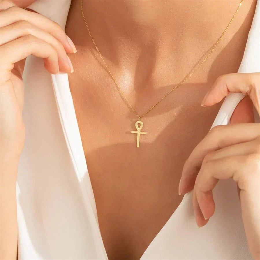 Gold Ankh Pendant Necklace" can be rewritten as "Elegant Gold Ankh Pendant Necklace.